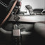 Reach 2S mounted under the dash as a quick-access car handgun safe holding a Sig Sauer pistol